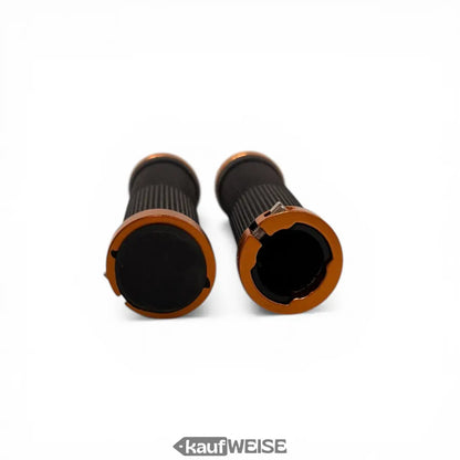 Orange und schwarze urban armor fahrradgriffe mit rutschfesten gummihüllen für stunt scooter bmx und mtb